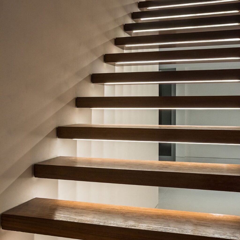 Wooden staircase of The Alpha / Bravo / Charlie House designed by Wanja Githongo, the lead architect at Guarcha Architects